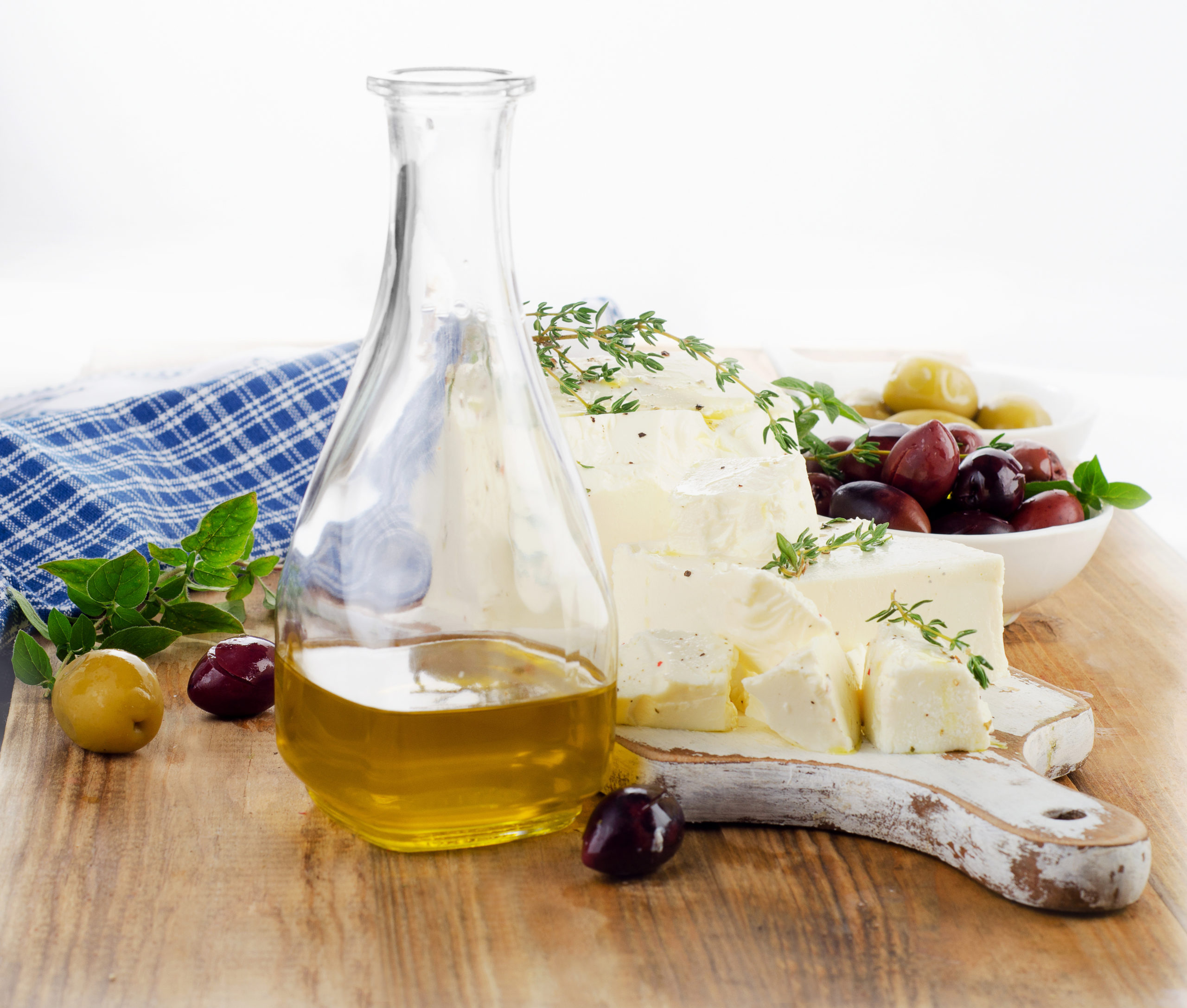 Feta cheese with olives, fresh herbs and olive oil.