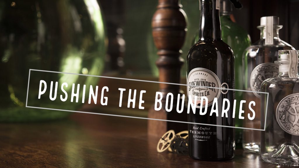 a decorative picture of sidewinder vermouth bottles and banner reading pushing the boundaries