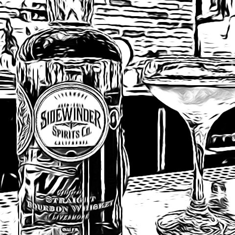 black and white ink drawing of sidewinder bourbon and coupe glass on bar