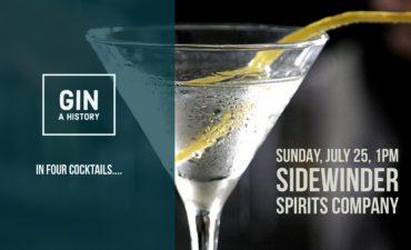 martini in martini glass with lemon peel garnish
