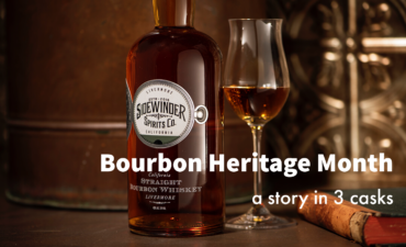 bottle of bourbon with snifter