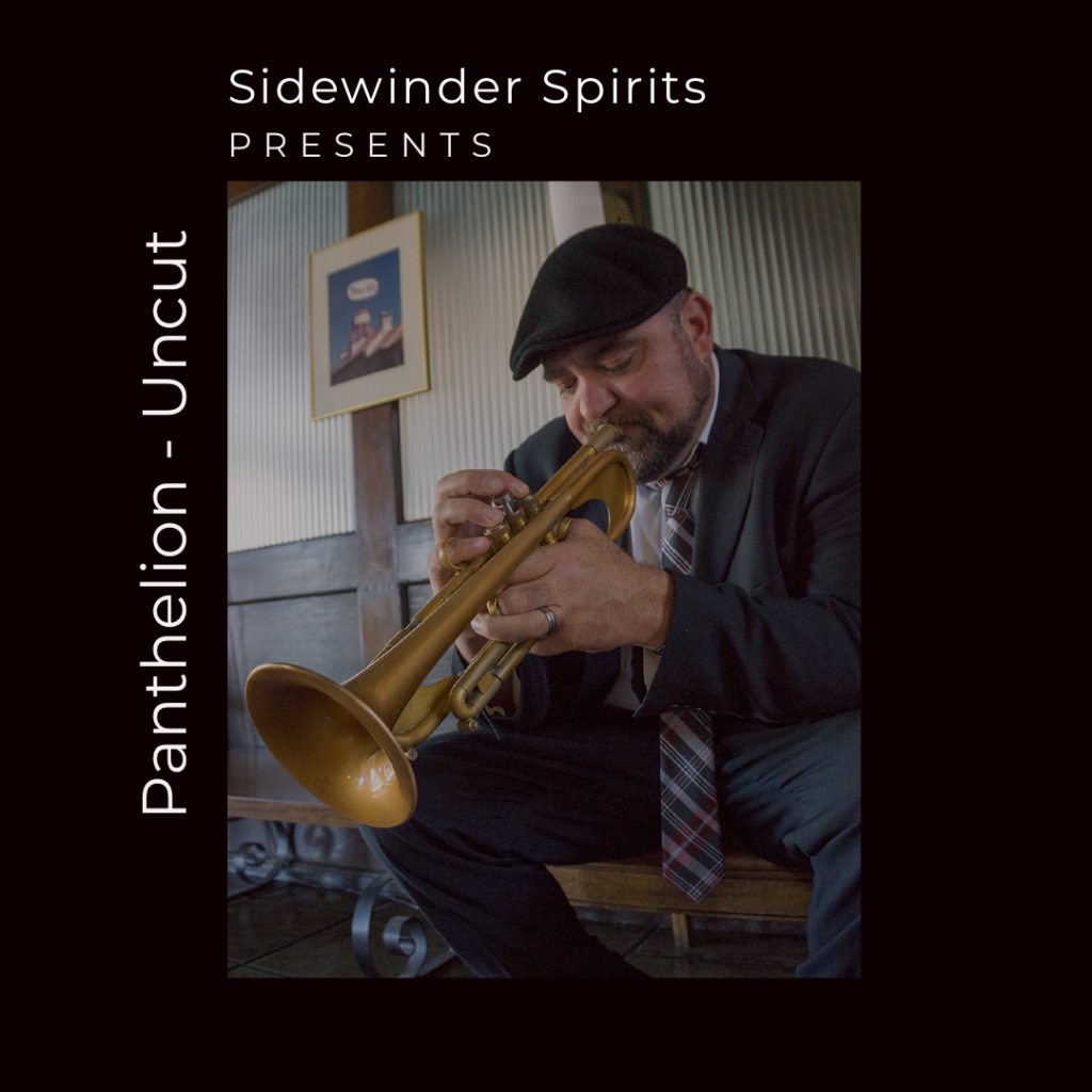 Trumpeter Jeff Bordes sitting with trumpet to his lips