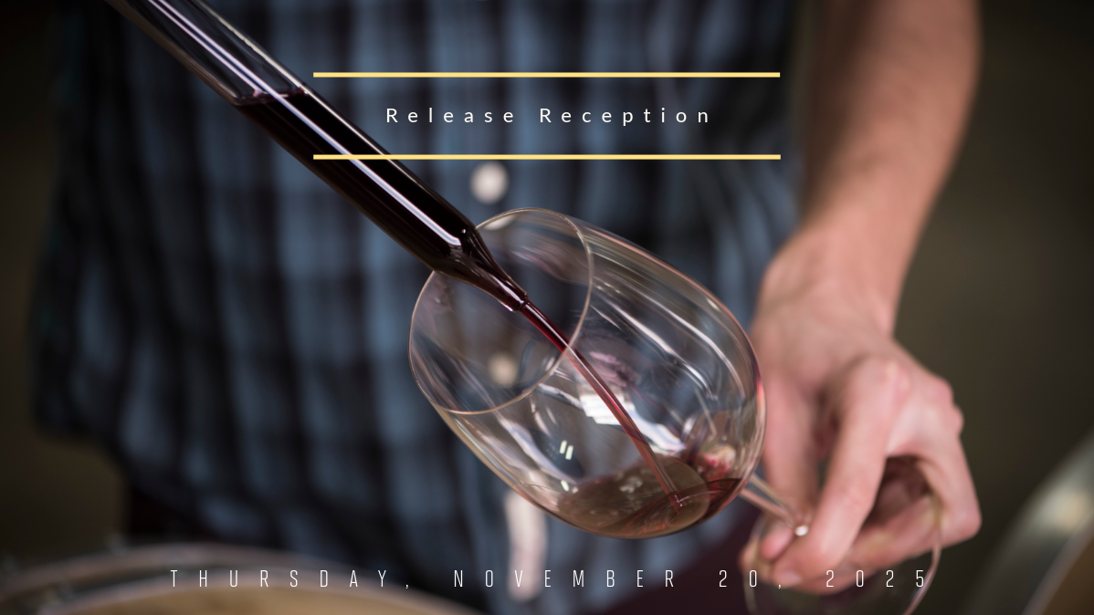 red wine being sampled from a barrel